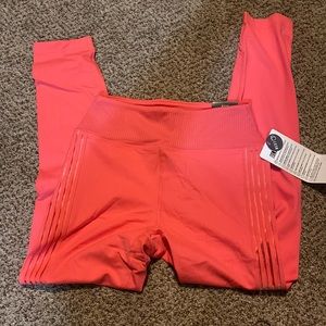 Pink leggings.
